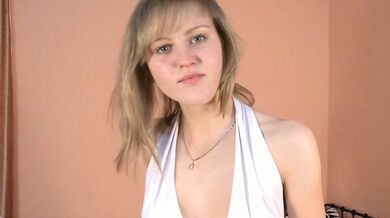 Julianna shows a ‘no panties upskirt’. She undresses and