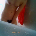 Innocent asian spy in a bathroom